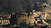 With monitors and lawsuits, Pakistanis fight for clean air
